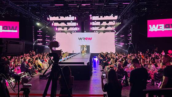 Audience gathers at the Full Sail Live venue to attend the Winter Park Fashion Show.