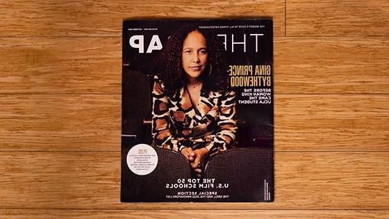 A bird’s eye view of the The Wrap issue. The magazine cover is a picture of Gina Prince-Bythewood, a women with brown hair wearing a brown and beige blazer.