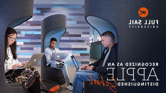 Three students using MacBooks sit on gray and blue chairs. The Full Sail logo is in the image’s top-left corner with the words “Recognized as an Apple Distinguished School” beneath it